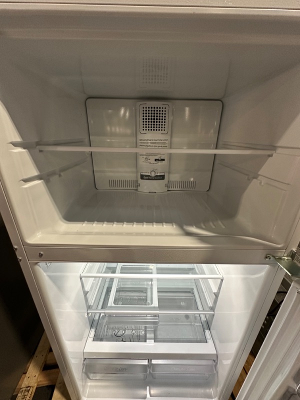 Photo 7 of GE Garage-ready 21.9-cu ft Top-Freezer Refrigerator (White)