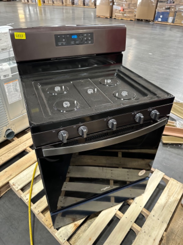 Photo 2 of 5.0 cu. ft. Gas Range with Center Oval Burner