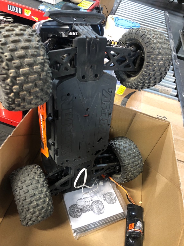 Photo 4 of ARRMA RC Truck 1/10 Granite 4X2 Boost MEGA 550 Brushed Monster with Battery Orange