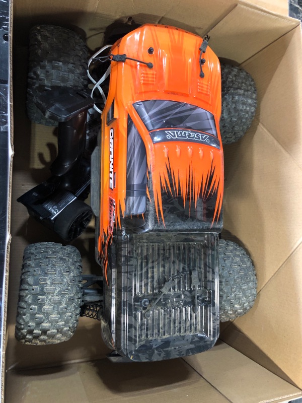 Photo 2 of ARRMA RC Truck 1/10 Granite 4X2 Boost MEGA 550 Brushed Monster with Battery Orange