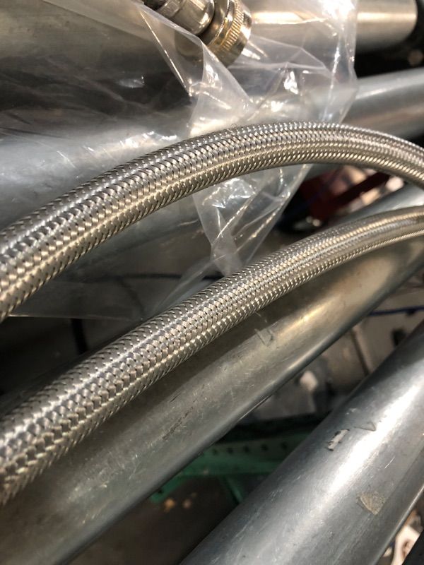 Photo 1 of **USED**
8 ft. Washing Machine Fill Hose, Stainless Steel
