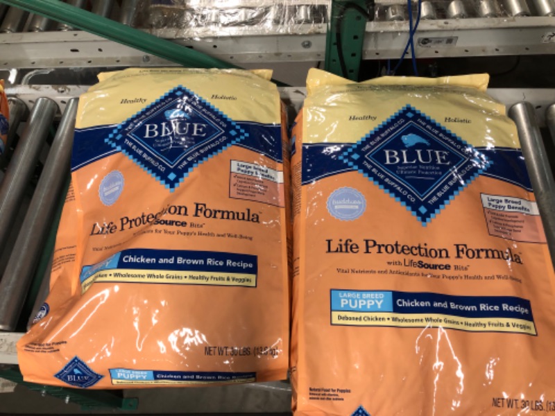 Photo 2 of **EXPIRES 11/21/23**
Blue Buffalo Life Protection Formula Natural Puppy Large Breed Dry Dog Food, Chicken and Brown Rice 30-lb 30 Pound (Pack of 2