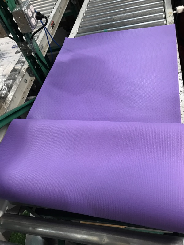 Photo 1 of **USED BUT APPEARS NEW** 2' Wide Yoga Mat - Purple