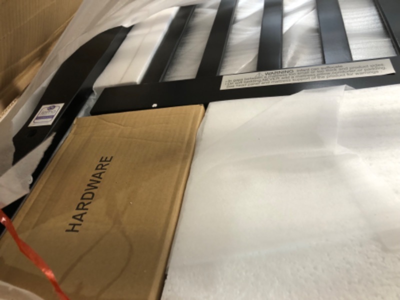Photo 1 of Dream On Me Aden 4-in-1 Convertible Mini Crib In Black, Greenguard Gold Certified, Non-Toxic Finish, New Zealand Pinewood, With 3 Mattress Height Settings Black Mini Crib