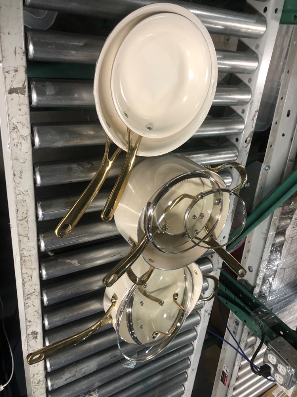 Photo 2 of **SCRATCHED, SEE LAST PHOTO** Martha Stewart Lockton Premium Nonstick PFA Free Ceramic Interior 10 Piece Heavy Gauge Enamel Aluminum Pots and Pans Cookware Set - Linen White w/Gold Handle 10-Piece Ceramic Nonstick Set Cookware Set Linen w/ Gold Handle