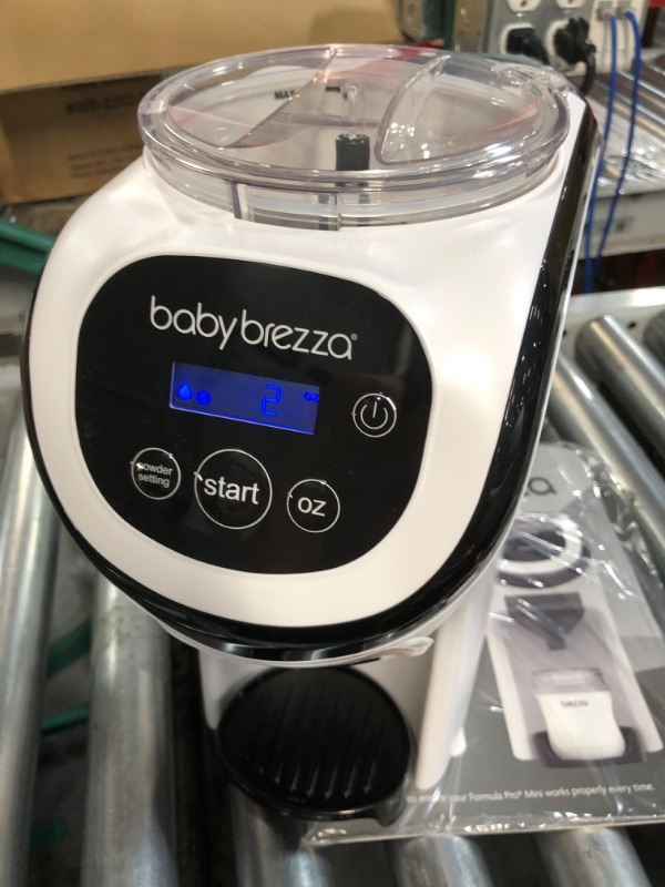 Photo 5 of **USED BUT APPEARS NEW** Baby Brezza Formula Pro Mini Baby Formula Maker – Small Baby Formula Mixer Machine Fits Small Spaces and is Portable for Travel– Bottle Makers Makes The Perfect Bottle for Your Infant On The Go Formula Pro Mini Dispenser Machine