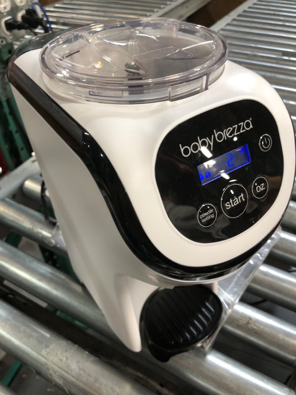 Photo 2 of **USED BUT APPEARS NEW** Baby Brezza Formula Pro Mini Baby Formula Maker – Small Baby Formula Mixer Machine Fits Small Spaces and is Portable for Travel– Bottle Makers Makes The Perfect Bottle for Your Infant On The Go Formula Pro Mini Dispenser Machine