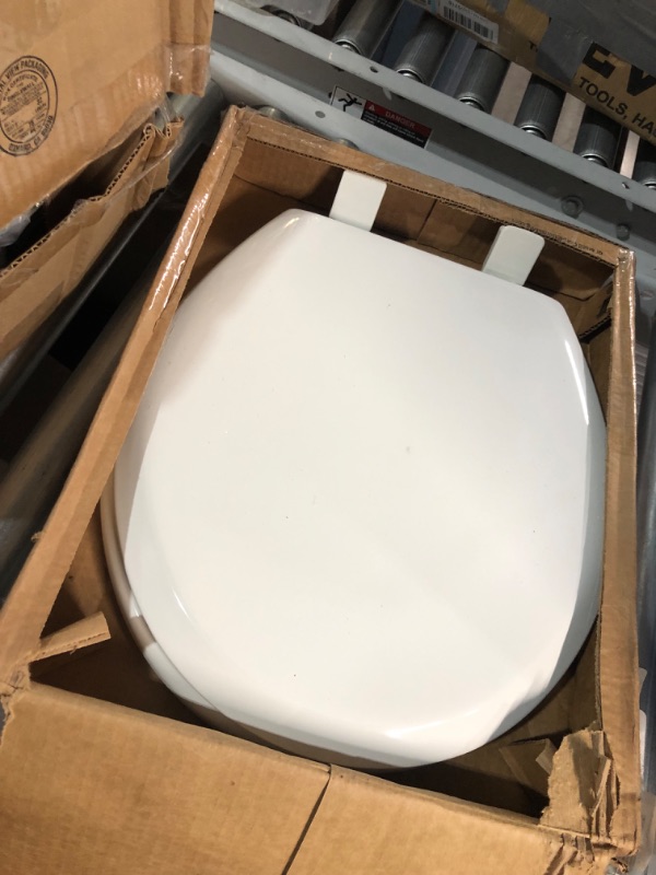 Photo 2 of [FOR PARTS, READ NOTES]
MAYFAIR 888SLOW 000 NextStep2 Toilet Seat with Built-In Potty Training Seat, Slow-Close, Removable that will Never Loosen, ROUND, White Round White