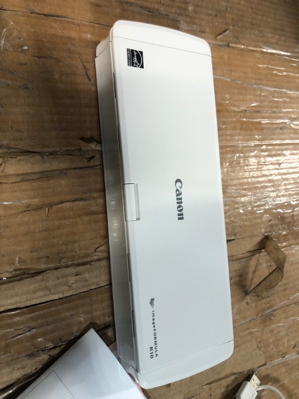 Photo 2 of *used*
Canon imageFORMULA R10 Portable Document Scanner, 2-Sided Scanning with 20 Page Feeder, Includes Software, (4861C001)