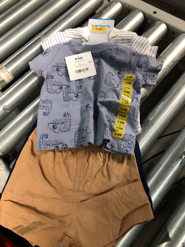 Photo 1 of Carter's 3-Piece Giraffe Little Short Set

2 PK
9-12mo
