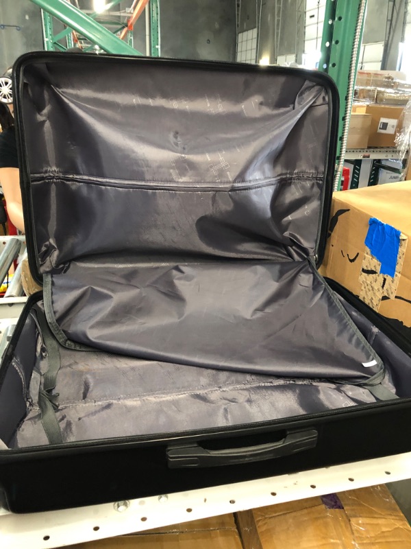 Photo 3 of ***SCRATCHED - ONE OF THE WHEELS HAS BROKEN OFF - SEE PICTURES***
Rockland Malibu Hardside Expandable Spinner Wheel Luggage, Black, 28" 