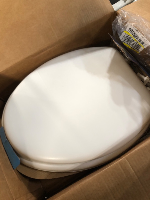 Photo 2 of (READ NOTES) Soft Elongated Vinyl Toilet Seat, White - 19 Inch Soft Vinyl Cover with Comfort Foam Cushioning - Fits All Elongated Size Fixtures - Easy to Install Fantasia by Achim Home Decor