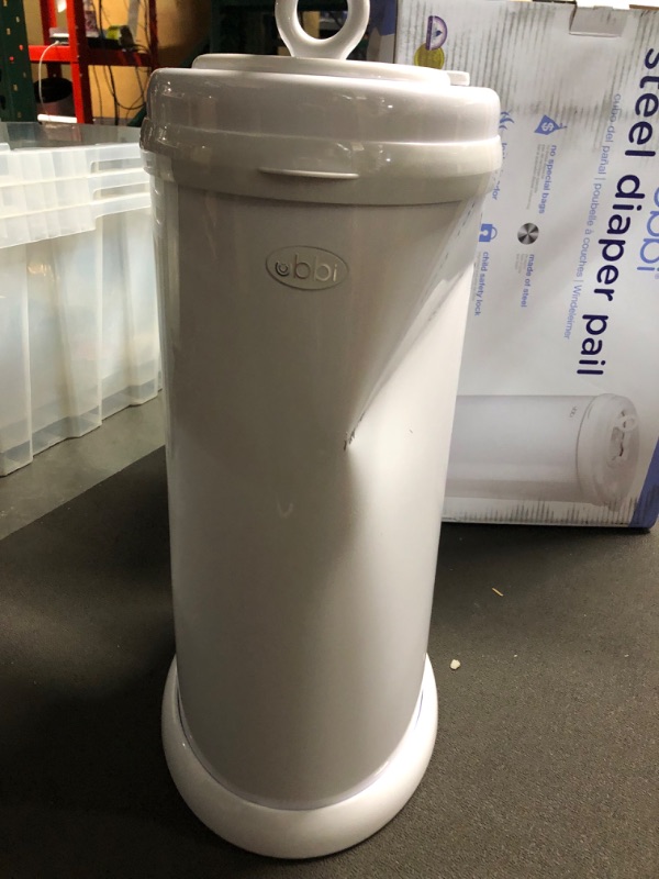 Photo 6 of **DAMAGED** Ubbi Steel Odor Locking, No Special Bag Required Money Saving, Awards-Winning, Modern Design, Registry Must-Have Diaper Pail, White