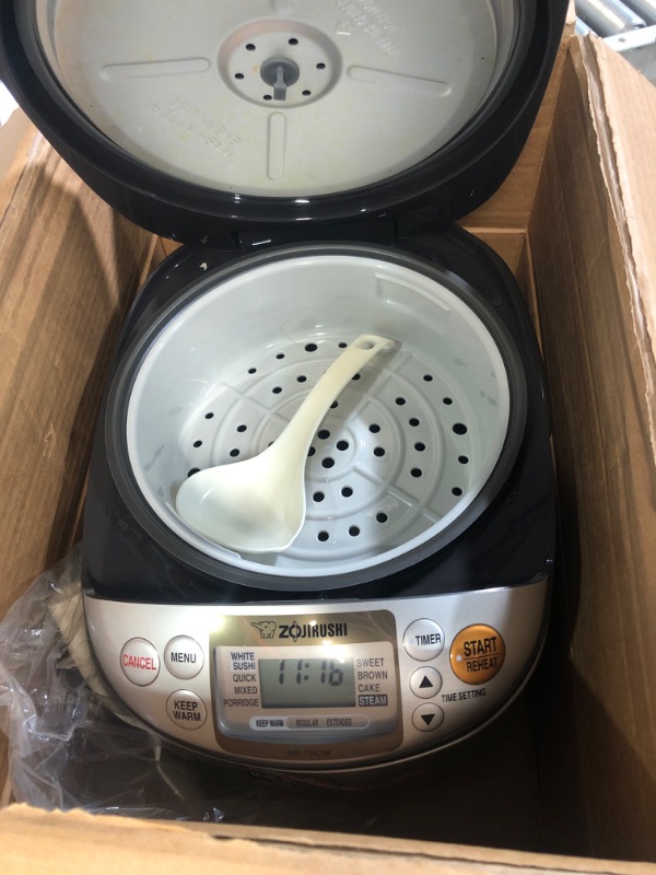 Photo 2 of * used * 
Zojirushi NS-LGC05XB Micom Rice Cooker & Warmer, 3-Cups (uncooked), Stainless Black