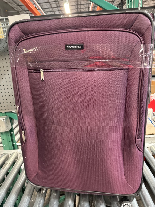 Photo 1 of 28" rolling purple/plum suitcase/luggage