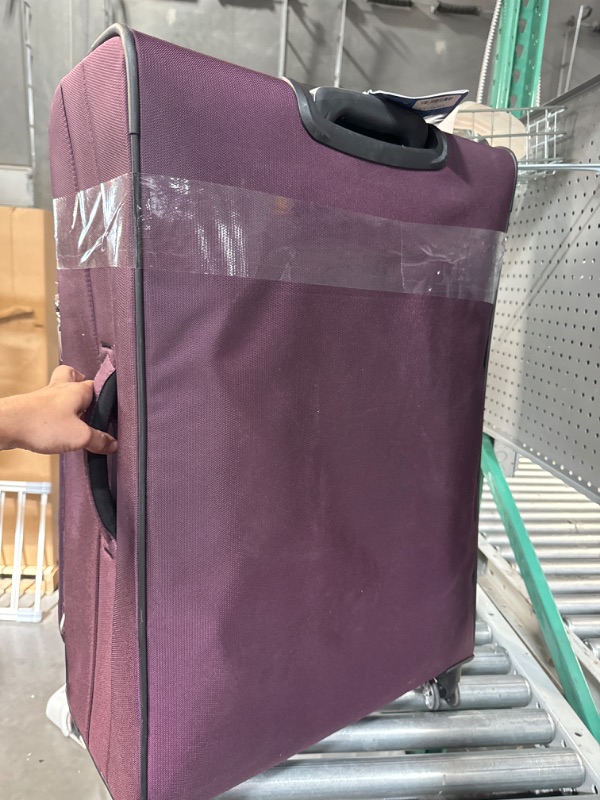 Photo 1 of 28" rolling purple/plum suitcase/luggage