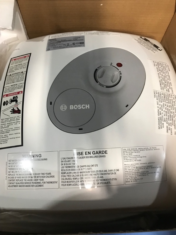 Photo 4 of ***USED - CORRODED - WIRES CUT - SEE PICTURES - UNABLE TO TEST***
Bosch Electric Mini-Tank Water Heater Tronic 3000 T 7-Gallon (ES8)