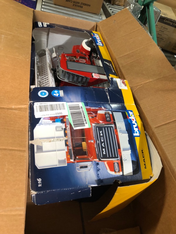 Photo 1 of Bruder 02821 Mack Granite Fire Engine Truck w/ Working Water Pump, Lights & Engine Sounds