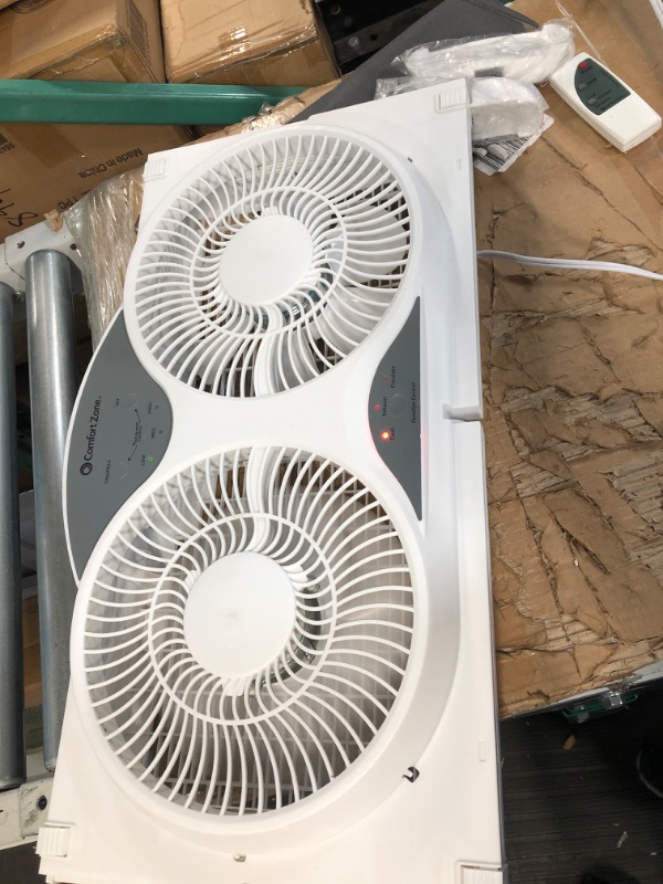 Photo 4 of **NONREFUNDABLE**FOR PARTS OR REPAIR**SEE NOTES**
Comfort Zone CZ310R Adjustable Width 3 Speed Dual Reversible Fan with Remote Control and Removable Cover, White