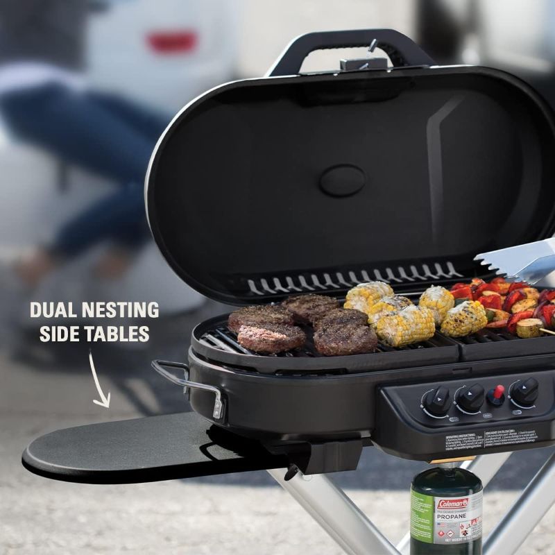 Photo 1 of **SEE NOTES/FOR PARTS**
Coleman RoadTrip 285 Portable Stand-Up Propane Grill Green Grill