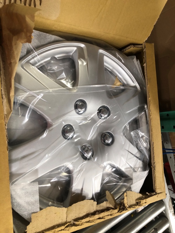 Photo 2 of Four ABS Plastic Silver Colored Hubcaps - 15 Inch Diameter