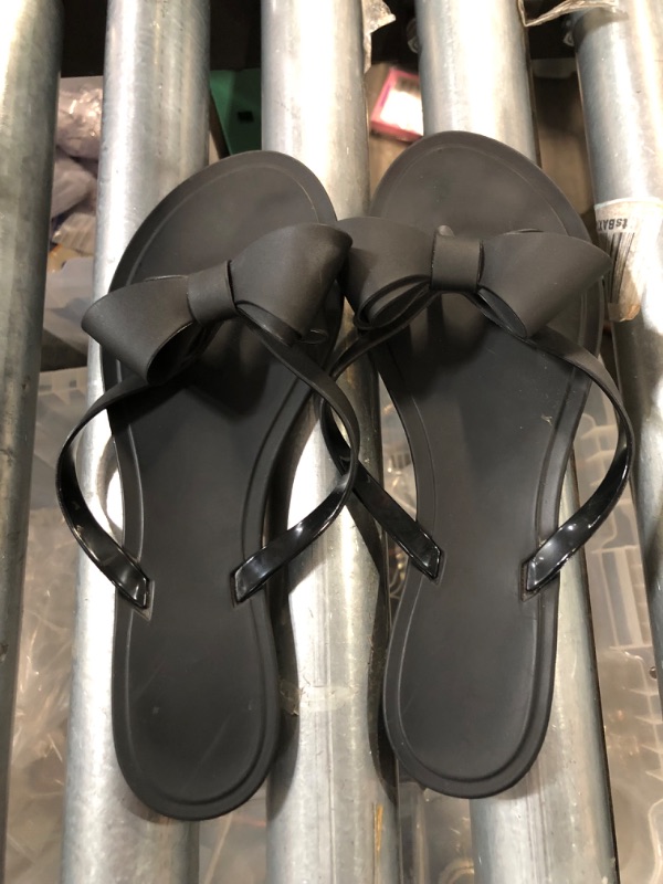 Photo 1 of Women's Black Jelly Bow Flip Flops, Size 40