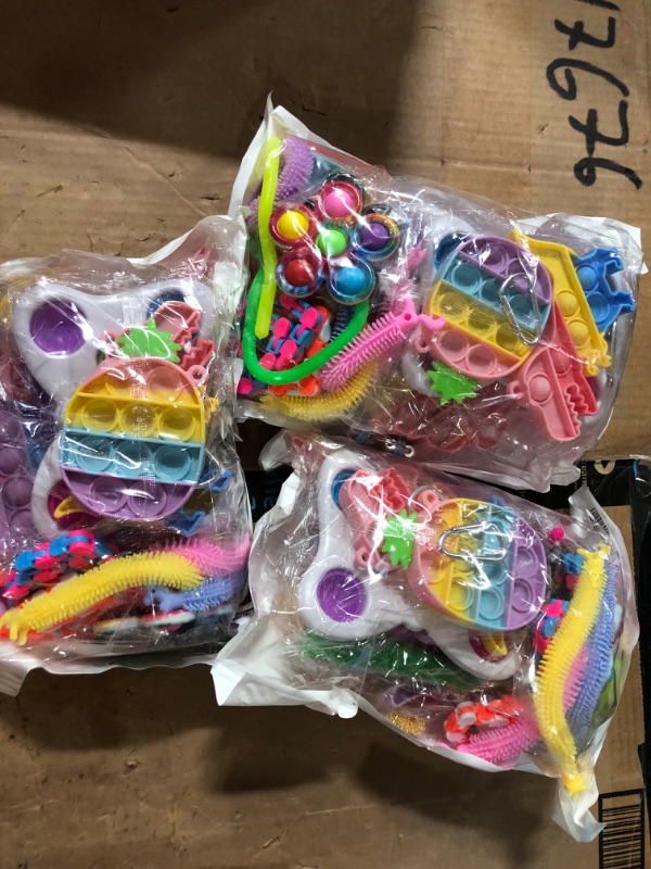 Photo 1 of 3 packs of fidgets