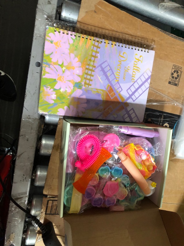 Photo 1 of BUNDLE OF Notebook and fidgets