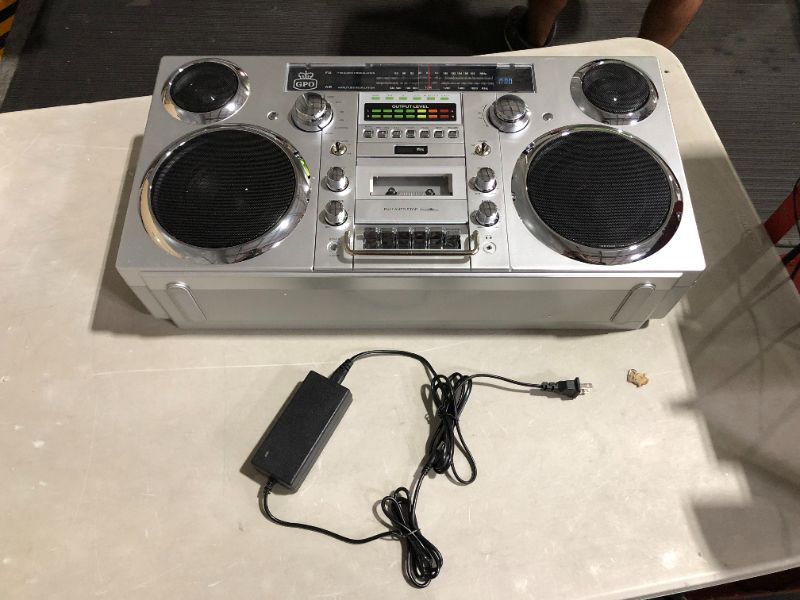 Photo 5 of **SEE NOTES**
GPO Brooklyn 1980S-Style Portable Boombox - CD Player, Cassette Player, FM Radio, USB, Wireless Bluetooth Speaker - Silver