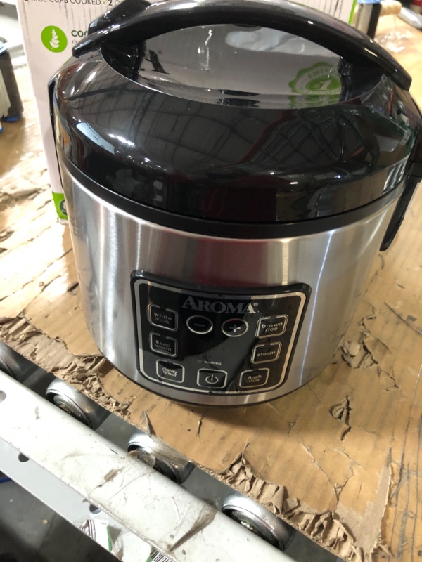 Photo 2 of * item used and damaged * see all images *
Aroma Housewares ARC-914SBD Digital Cool-Touch Rice Grain Cooker and Food Steamer,