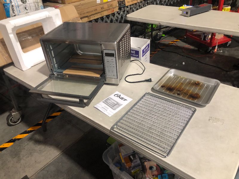 Photo 2 of ***USED - SEE NOTES***
Oster Air Fryer Oven, 10-in-1 Countertop Toaster Oven Air Fryer Combo, 10.5" x 13"