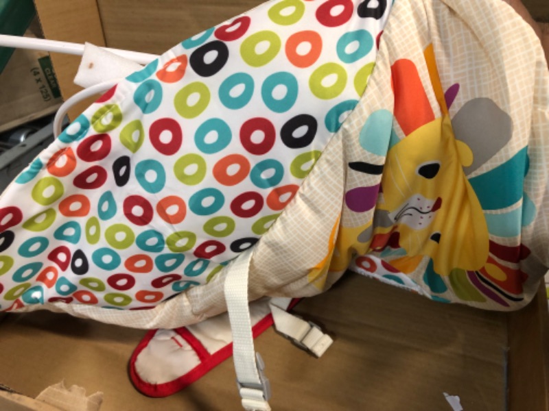 Photo 1 of Bright Starts Playful Pinwheels Portable Baby Bouncer 19.8x13.1x3.4 Inch, Age 0-6 Months