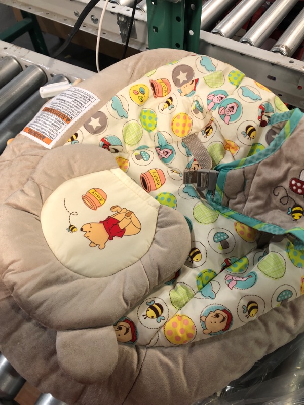 Photo 4 of Bright Starts Winnie the Pooh Dots & Hunny Pots Baby Bouncer with Vibrating Infant Seat, Music & 3 Playtime Toys, 23x19x23 Inch