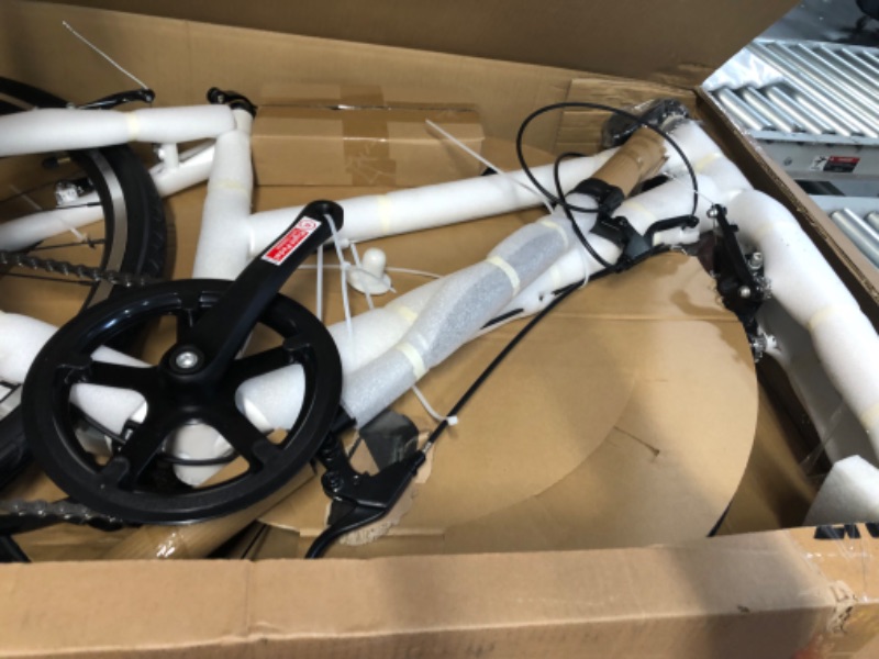 Photo 1 of **PARTS ONLY, EXTREME DAMAGE TO CHAIN, AXEL, AND FUNCTIONS, NEEDS REPAIR/USE FOR PARTS** WHITE Bike, 28 inch Adult Bike
