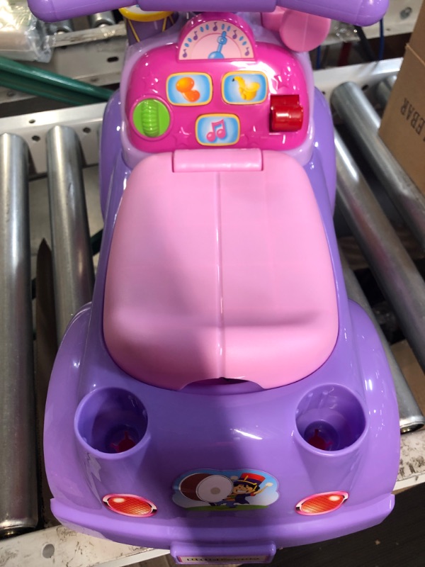 Photo 3 of Fisher Price Music Parade Purple Ride-On with 5 Different Marching Tunes! [Amazon Exclusive]