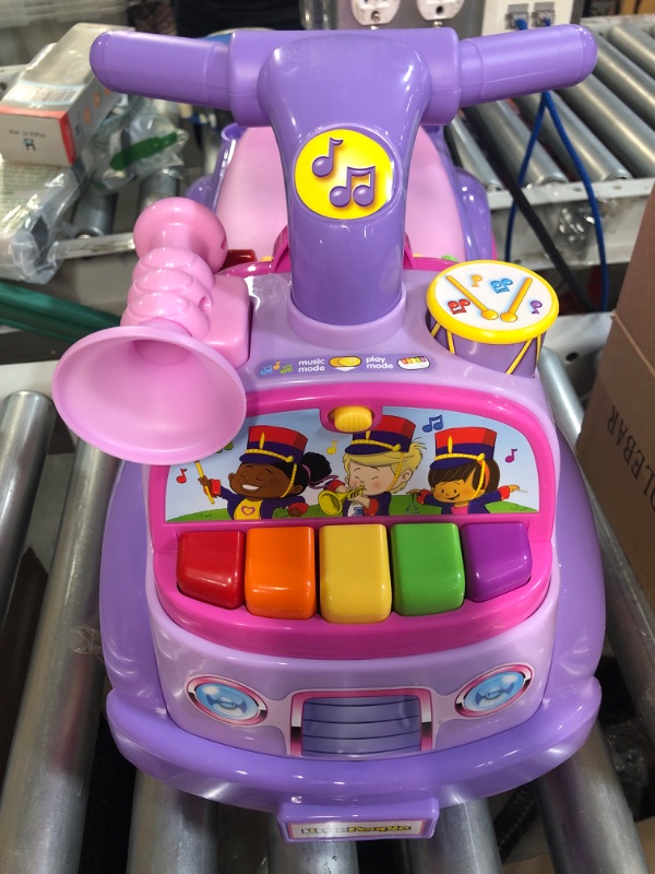 Photo 2 of Fisher Price Music Parade Purple Ride-On with 5 Different Marching Tunes! [Amazon Exclusive]