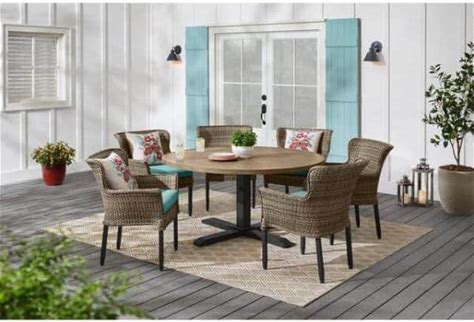 Photo 1 of ***MISSING TABLE - CHAIRS ONLY - SEE NOTES***
Hampton Bay Devonwood 7 Piece Dark Brown Wicker Outdoor Patio Dining Set with Aloe Cushions