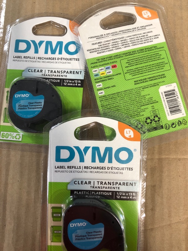 Photo 2 of DYMO - DYM16952 Authentic LetraTag Labeling Tape for LetraTag Label Makers, Black Print on Clear pastic Tape, 1/2'' W x 13' L, 1 roll (16952) 156 in. X 1/2 in.