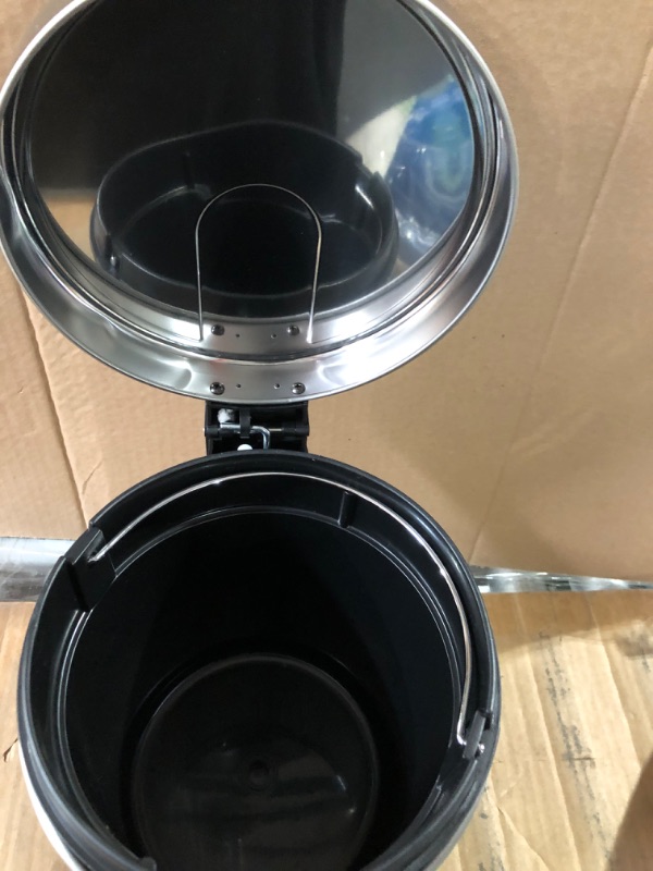 Photo 3 of **item used**item has dents**see images**
Amazon Basics 5 Liter / 1.3 Gallon Round Soft-Close Trash Can with Foot Pedal - Stainless Steel 5L / 1.3 Gallon