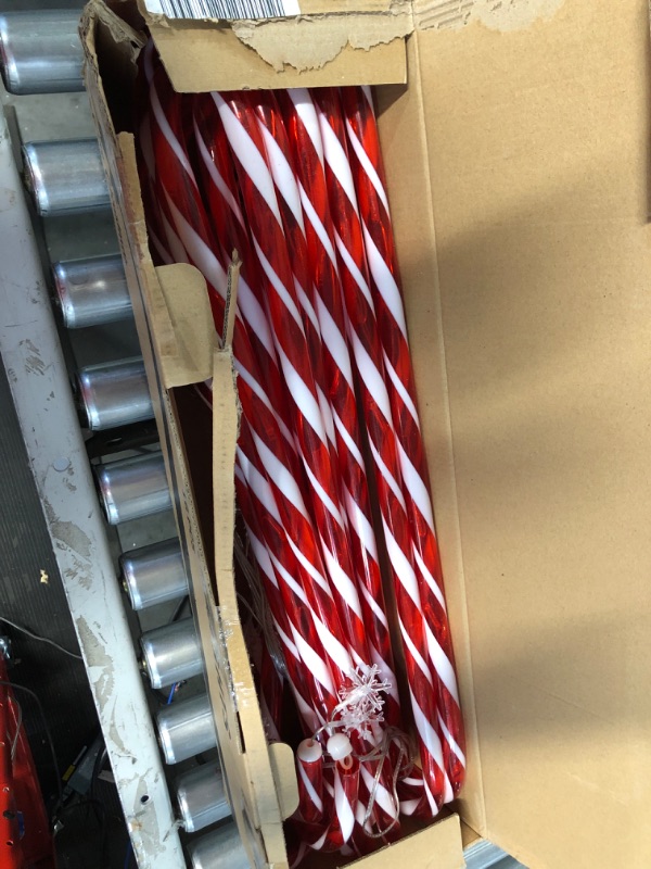 Photo 2 of **USED** Outside Christmas Decorations, 16 Pack 28” Candy Cane Lights Outdoor Pathway, 52ft in Length 160 LED Lights in Total