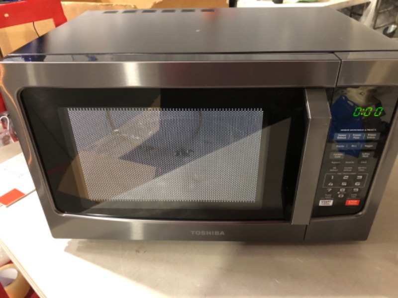 Photo 1 of `**Minor Damage** TOSHIBA EM131A5C-BS Countertop Microwave Ovens 1.2 Cu Ft, 12.4" Removable Turntable Black 