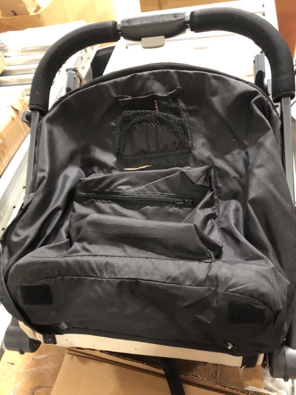 Photo 2 of **SEE NOTES**
Joovy Kooper Lightweight Baby Stroller Featuring Removable, Swing-Open Tray, Big Wheels, Reclining Seat with Footrest, Extra-Large Retractable Canopy, and Compact Fold (Sand)