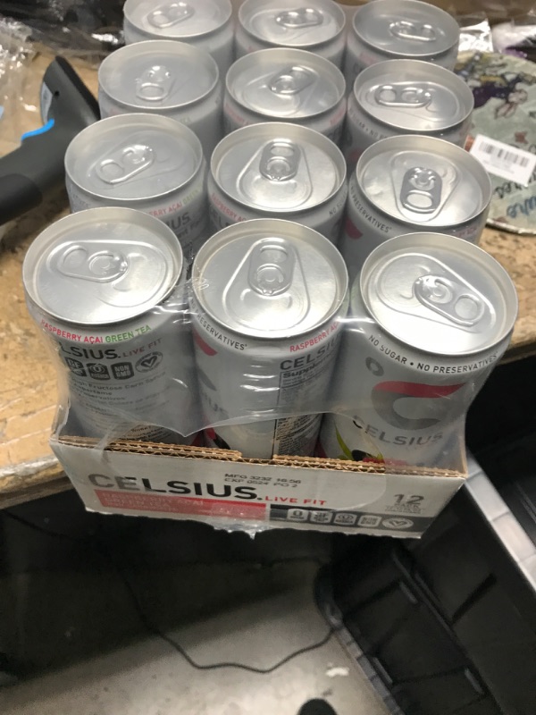 Photo 3 of **** EXP 05/24**** CELSIUS Raspberry Acai Green Tea, Functional Essential Energy Drink 12 Fl Oz (Pack of 12) Raspberry Acai Green Tea 12 Fl Oz (Pack of 12)