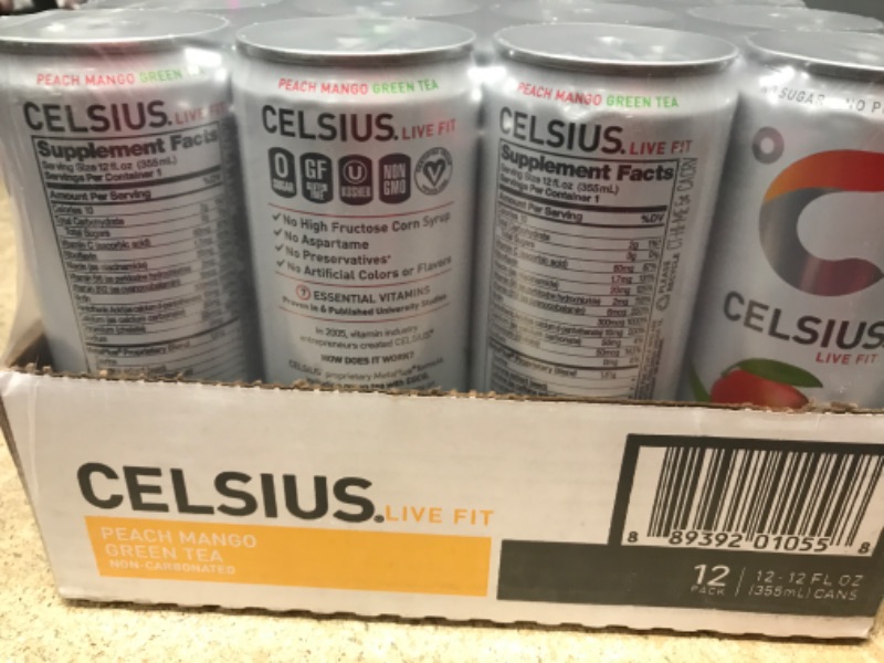 Photo 2 of *** EXP 4/2024 *** CELSIUS Peach Mango Green Tea, Functional Essential Energy Drink 12 Fl Oz (Pack of 12) Peach Mango Green Tea 12 Fl Oz (Pack of 12)