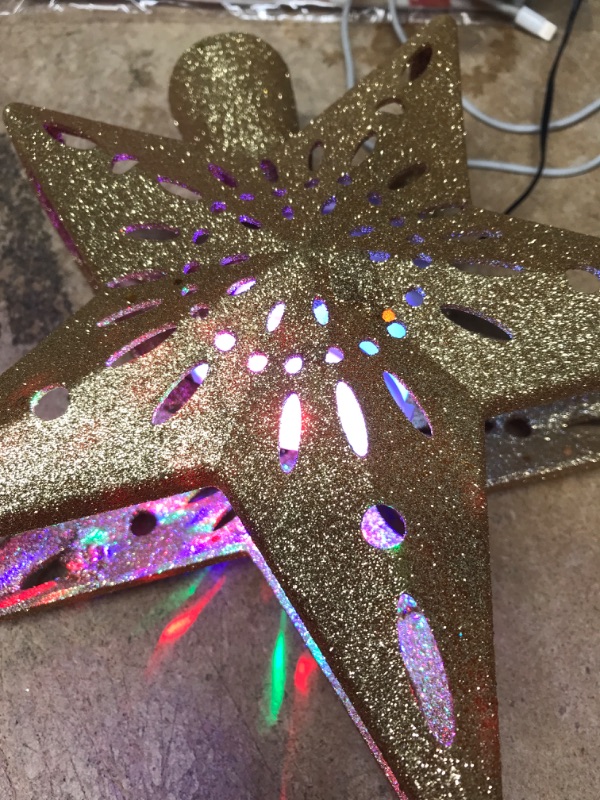 Photo 1 of *** POWERS ON *** Joiedomi Christmas Star Tree Topper with Projector Lights for Xmas Tree Decorations Gold
