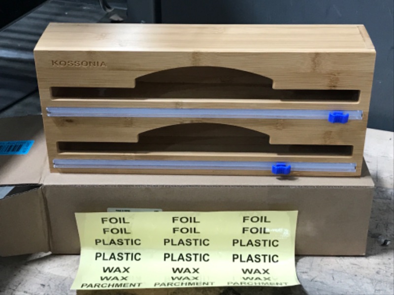 Photo 1 of **BRAND NEW**
Wrap Dispenser with Cutter, 2 in 1 KOSSONIA Foil and Plastic Wrap Organizer with Label, Aluminum Foil Organizer for Plastic Wrap, Aluminum Foil and Wax Paper, Bamboo Roll Organizer Holder for 12" Roll