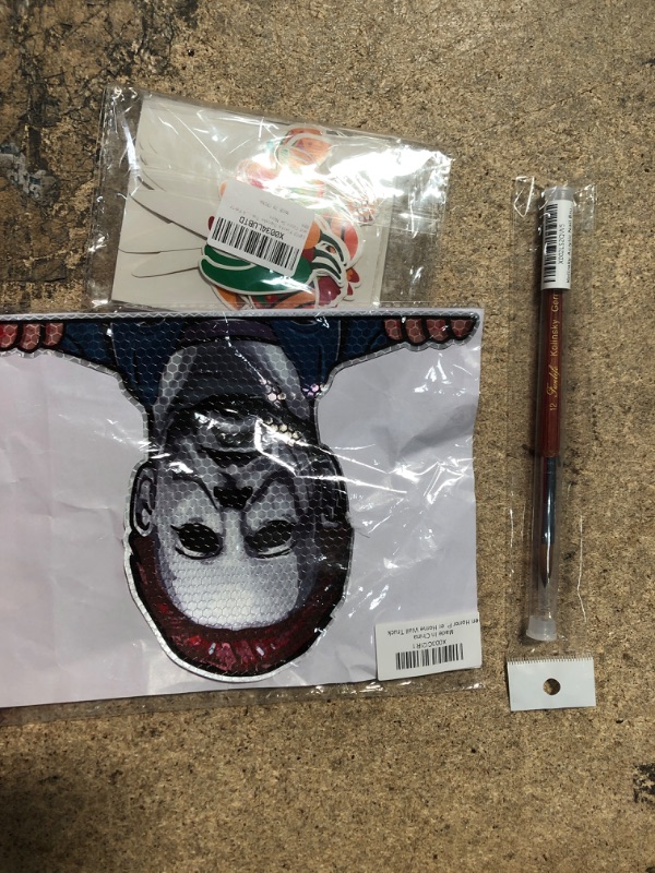 Photo 3 of 10 assorted items Michael Myers sticker for truck, nail brush, pupperoni, Halloween witch, and misc. 