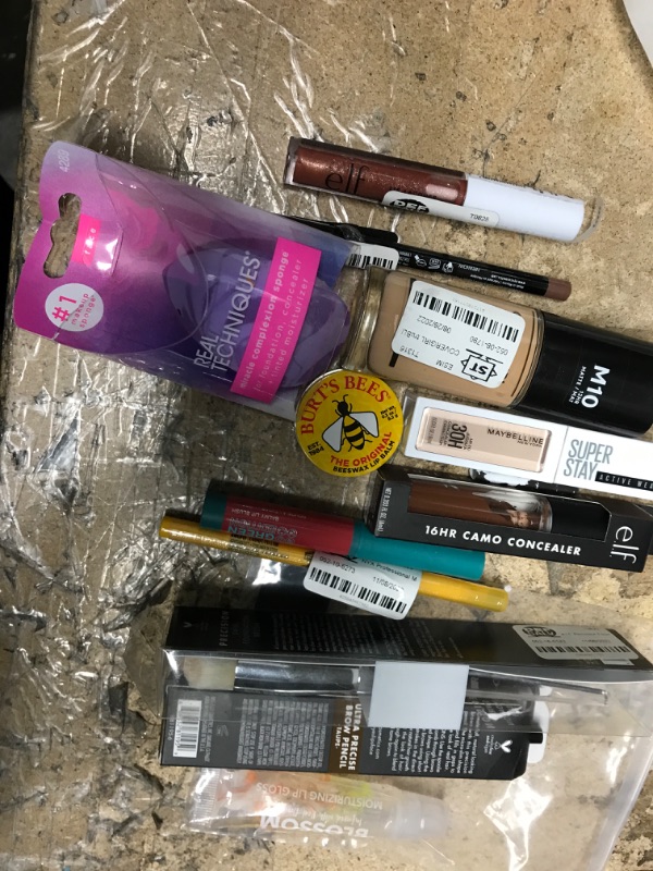 Photo 1 of 
12 BEAUTY / MAKEUP ITEMS: 
FOUNDATION, LIP, AND EYS
