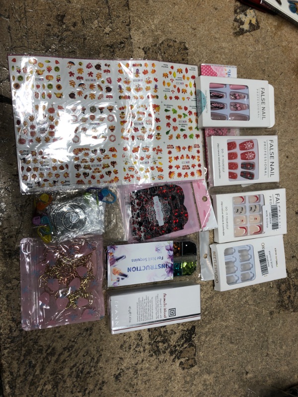 Photo 1 of BUNDLE OF ASSORTED NAIL ACCESSORIES (nails;stickers;handcream)
