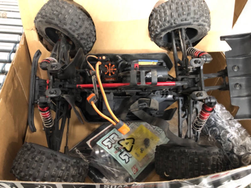 Photo 3 of ** MISSING main battery to pwer R/C **ARRMA 1/8 Notorious 6S V5 4WD BLX Stunt RC Truck with Spektrum Firma RTR (Transmitter and Receiver Included, Batteries and Charger Required), Black, ARA8611V5T1